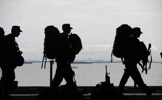 Silhouette of Soldiers Walking