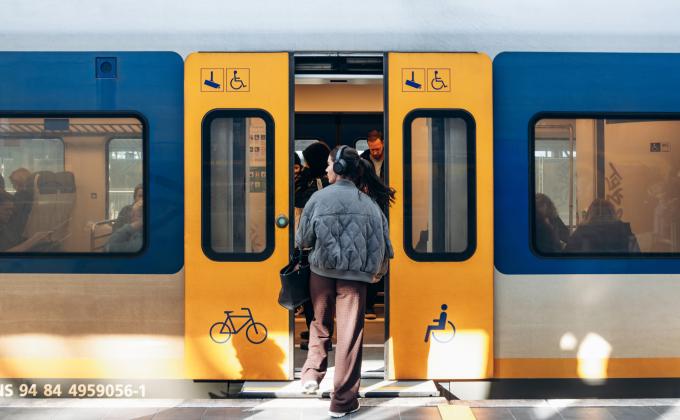 girl getting on train