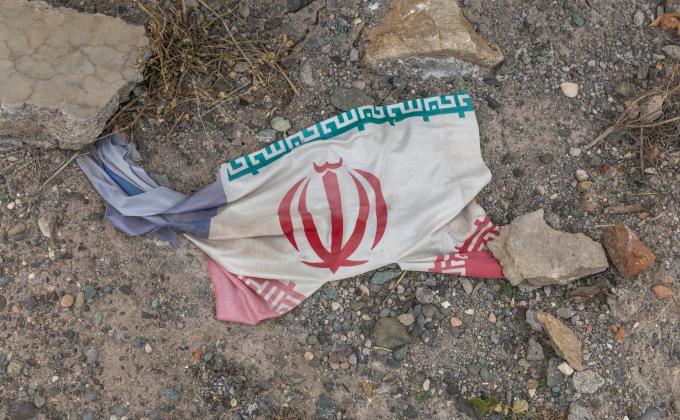 Iranian flag on the ground