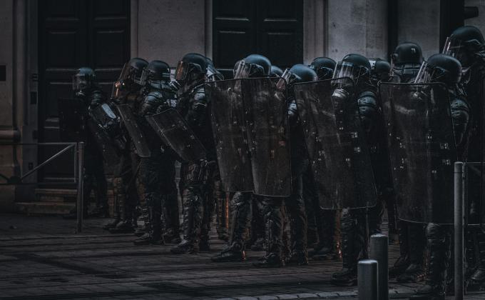 riot police Jean unsplash