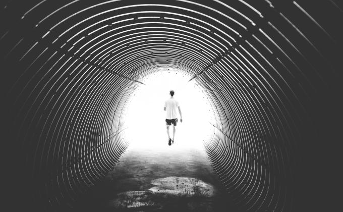 man end of tunnel walking pexels pixabay