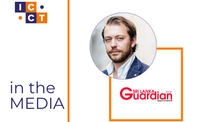 Thomas and the logo of Sri Lanka Guardian 